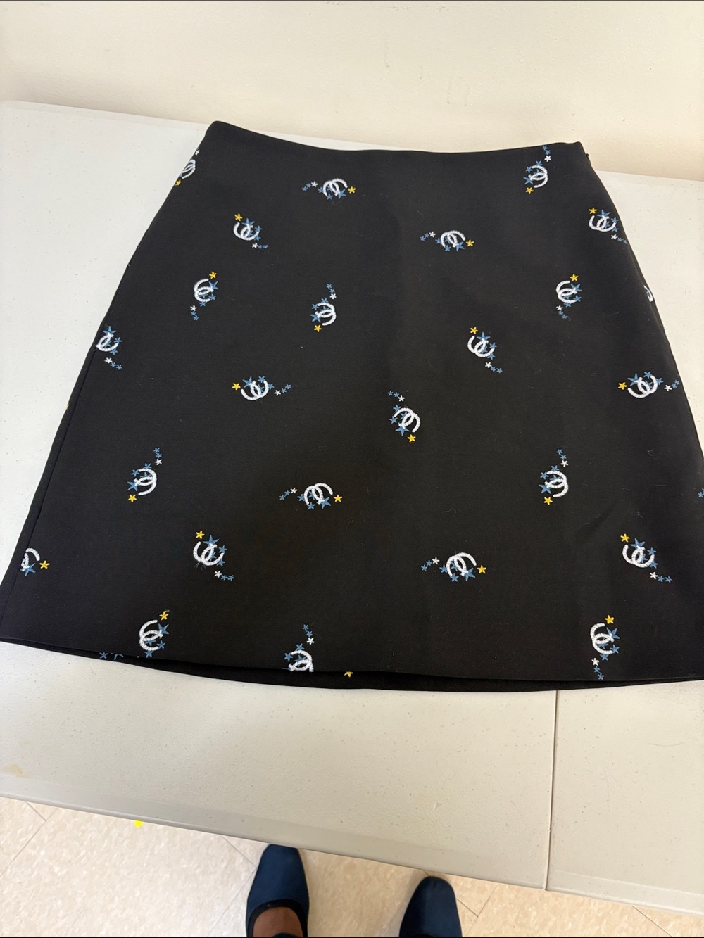Maje Black Mini Skirt with White and Yellow Star Embroidery